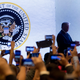 Image for article titled Trump Stands Next to Photoshopped Presidential Seal That Reads '45 is a Puppet' in Spanish